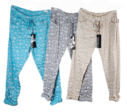 Shiny-Stretchhose, türkis mit Skull, Grösse 42/44 von ISSIMA