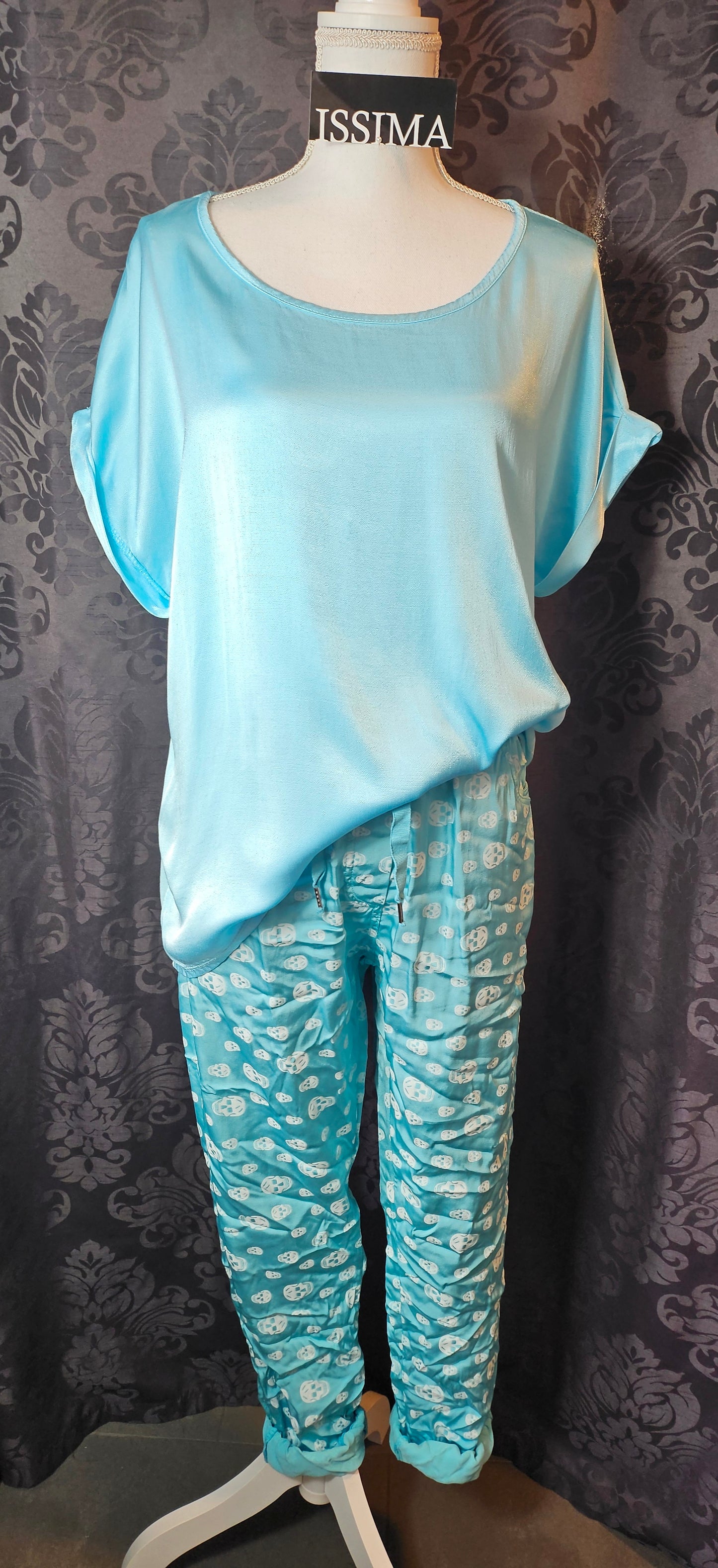 Shiny-Stretchhose, türkis mit Skull, Grösse 42/44 von ISSIMA