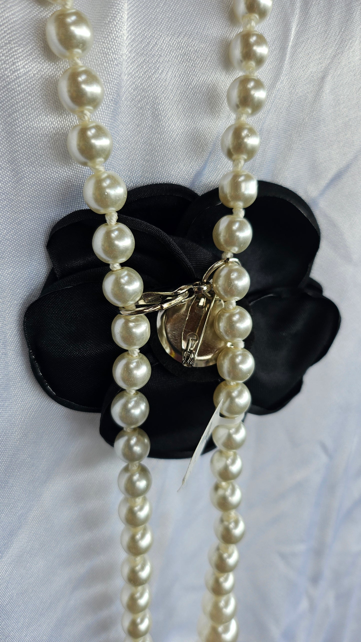 Perlenkette mit Blume